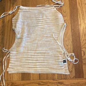 This knit adjustable top is perfect for the upcoming summer season.